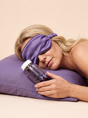 Boîte Meilleur Sommeil posée sur un oreiller